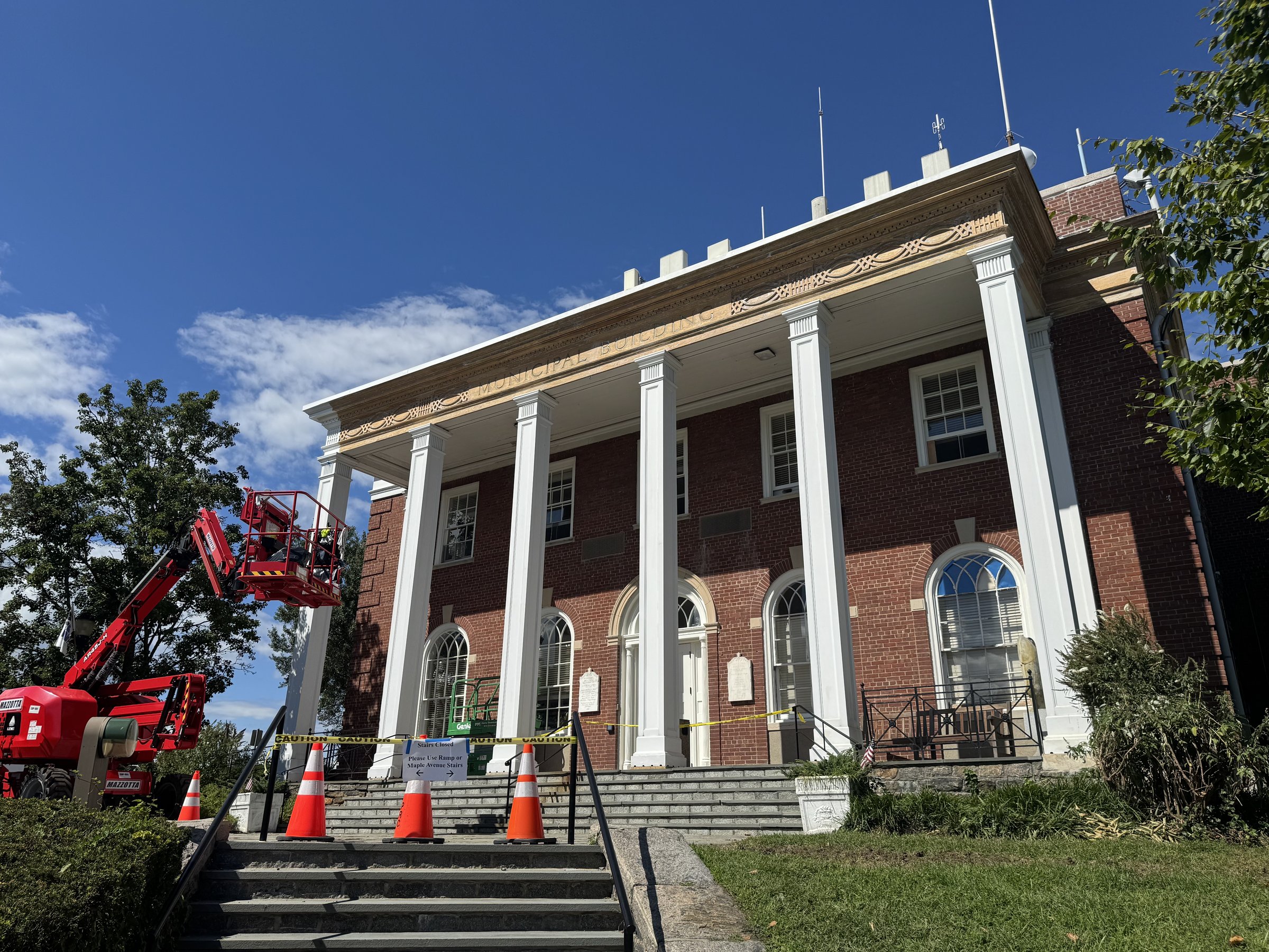 Hastings-on-Hudson municipal building with scaffolding during exterior renovations